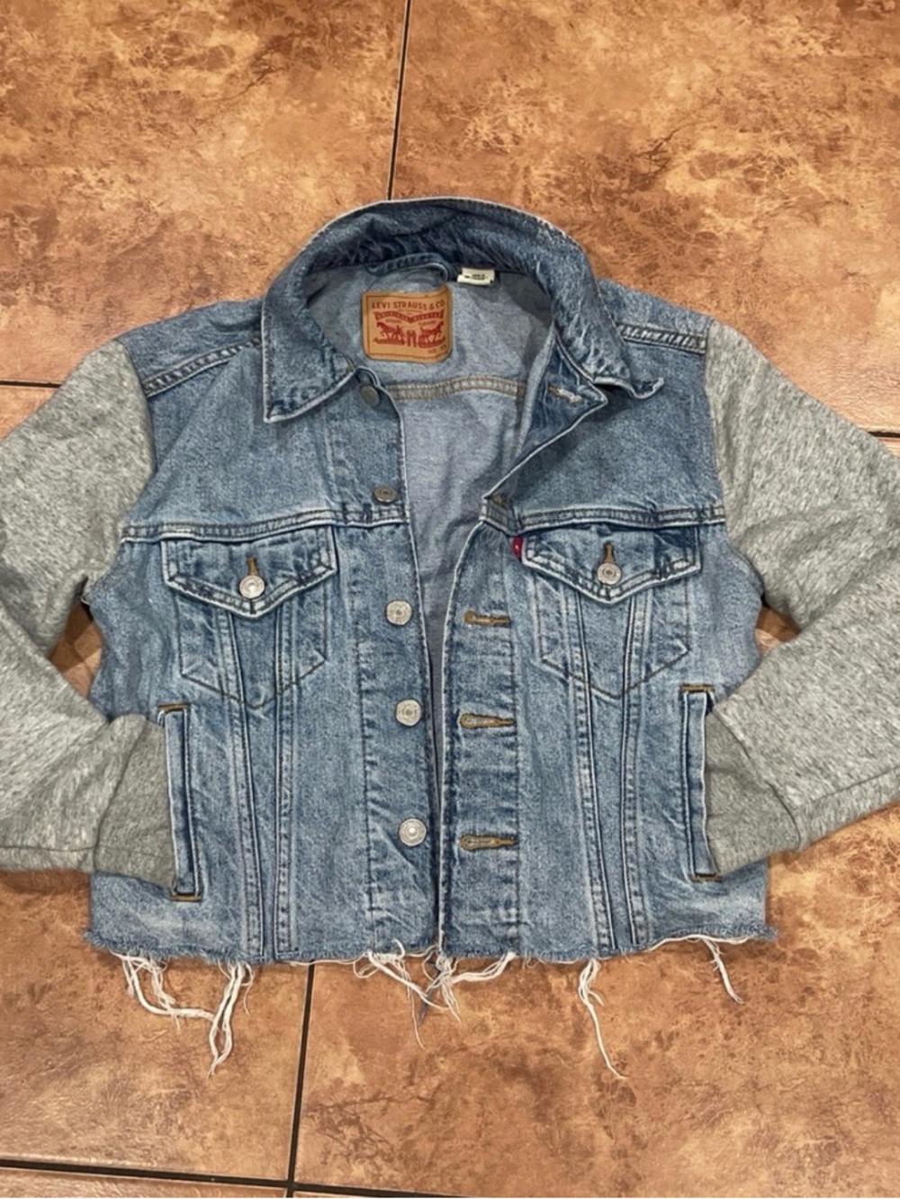 Levi's Blue Denim Trucker Jacket with Gray Sweatshirt Sleeves